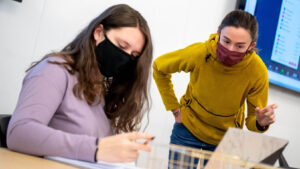 Students learning in a math class, wearing face masks
